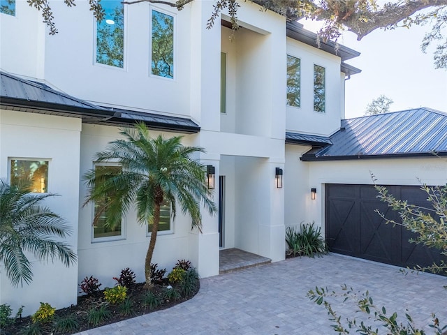 view of front of home with a garage