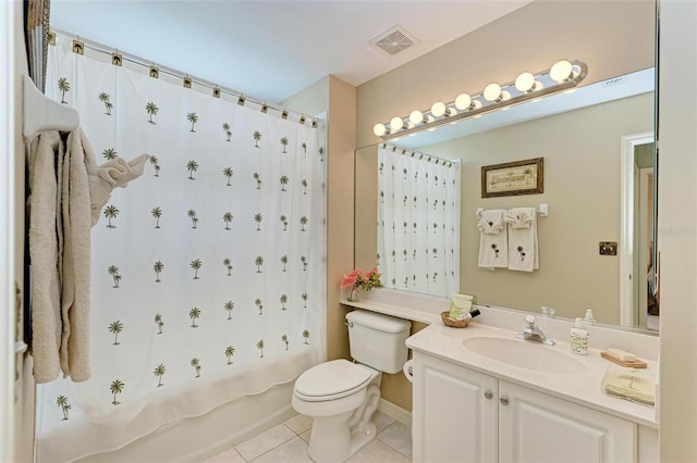 full bathroom featuring tile patterned floors, vanity, toilet, and shower / bath combination