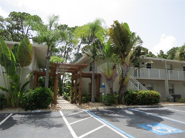 view of building exterior with cooling unit