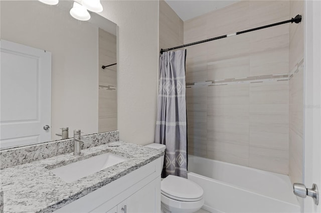 full bathroom with shower / tub combo with curtain, vanity, and toilet