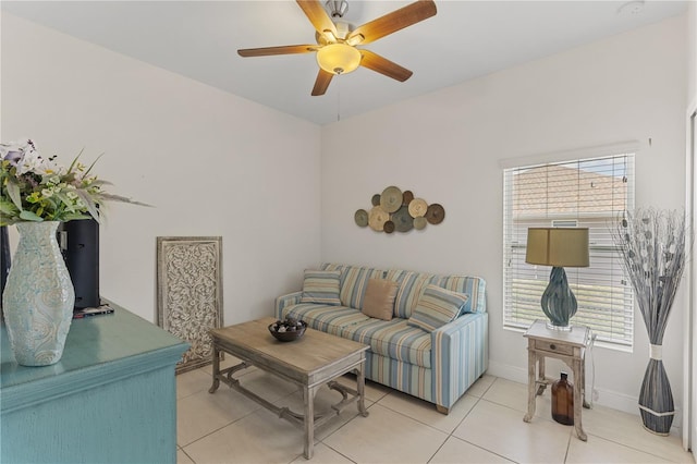 tiled living room featuring plenty of natural light and ceiling fan