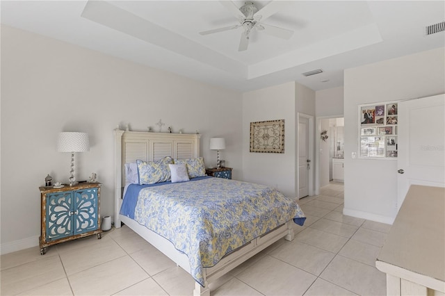 tiled bedroom featuring ceiling fan and a raised ceiling