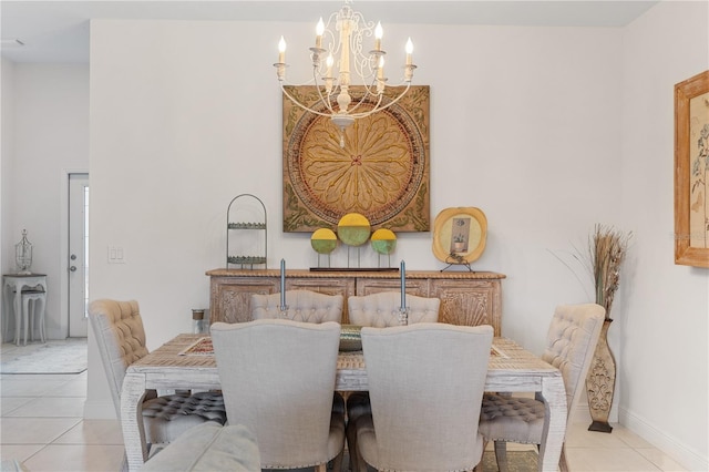 tiled dining space with an inviting chandelier