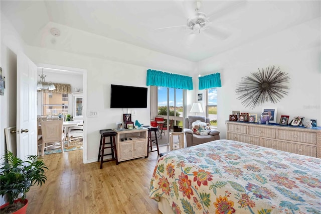 bedroom featuring ceiling fan and light hardwood / wood-style floors