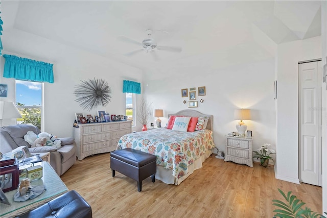 bedroom with light wood-type flooring and ceiling fan