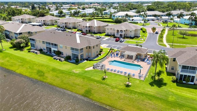 birds eye view of property featuring a water view