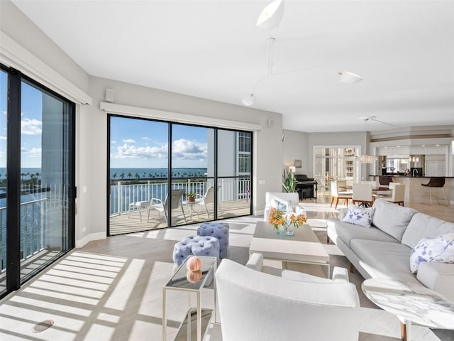 living room featuring a water view