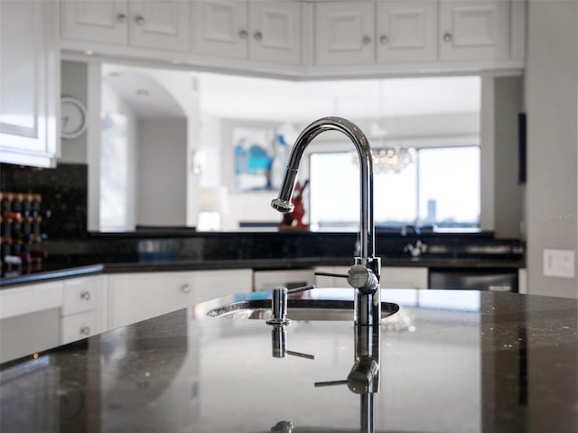 kitchen with white cabinetry and dishwasher