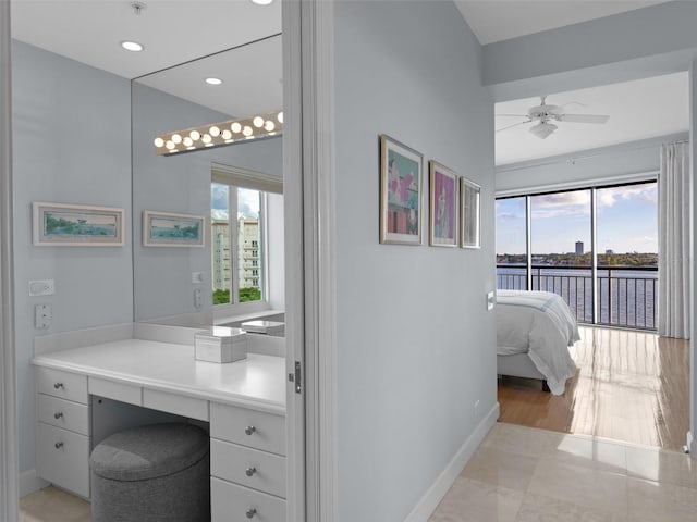 bathroom with vanity, tile patterned floors, and ceiling fan