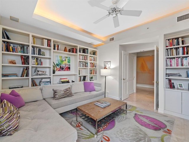 living room with ceiling fan