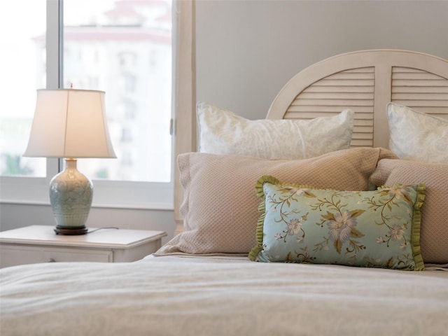 bedroom featuring multiple windows