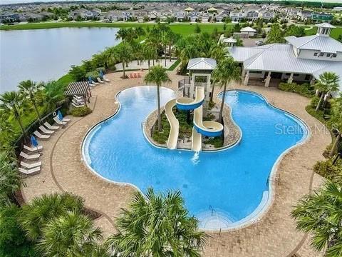 view of pool with a water view