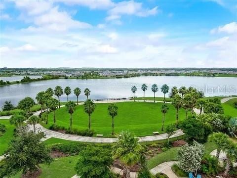 5415 Limelight Dr, Apollo Beach, FL 33572 - view of home's community featuring a water view and a lawn