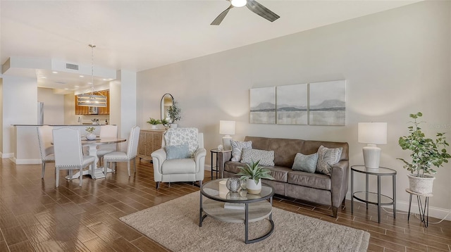 living room featuring ceiling fan