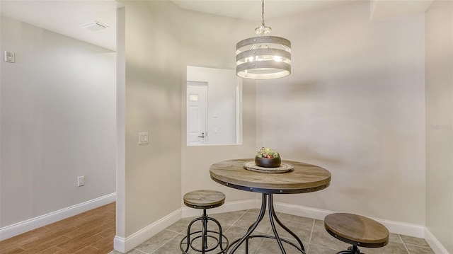 dining room with a chandelier