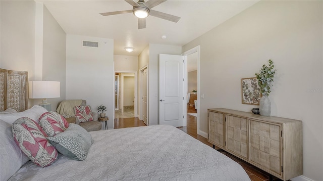 bedroom featuring hardwood / wood-style floors and ceiling fan