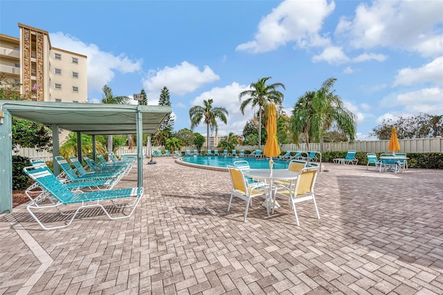 view of swimming pool with a patio area