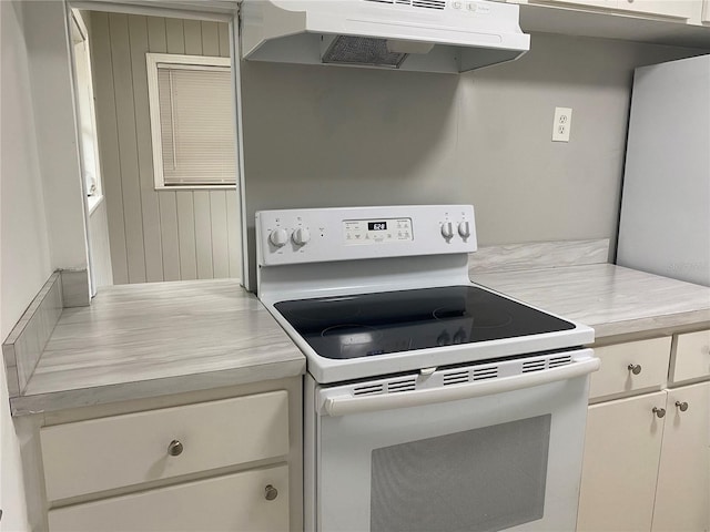 kitchen featuring electric range