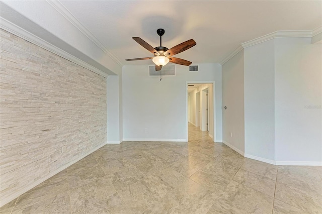 spare room with ceiling fan and ornamental molding