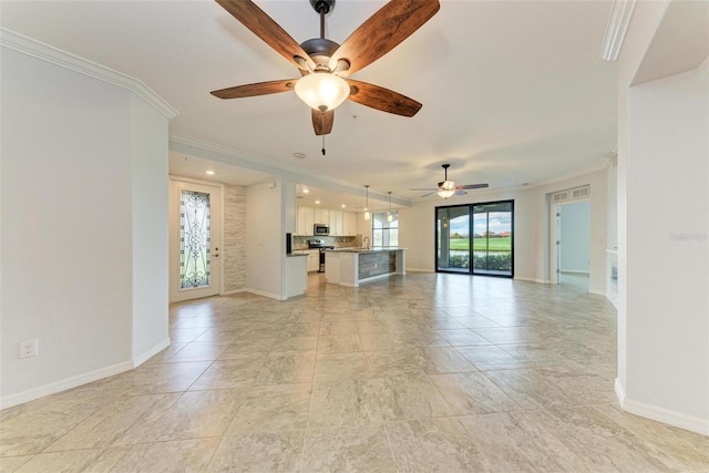 unfurnished living room with ceiling fan and ornamental molding