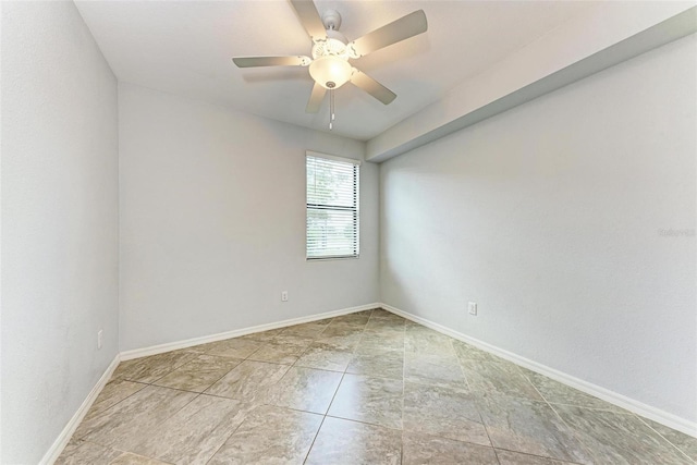 empty room featuring ceiling fan