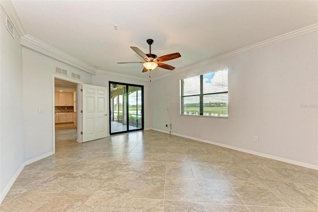 unfurnished room featuring ceiling fan and ornamental molding