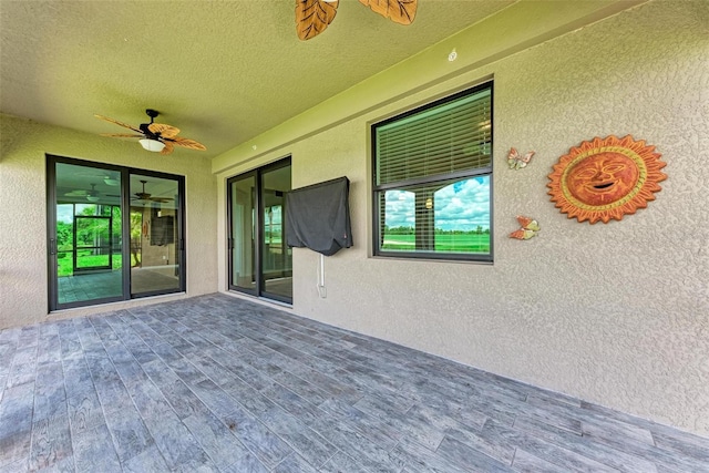 view of patio with ceiling fan