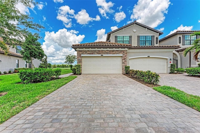 mediterranean / spanish-style home featuring a garage