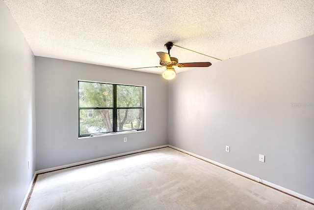 empty room with carpet, ceiling fan, and a textured ceiling