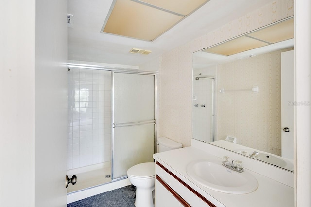 bathroom with a shower with shower door, oversized vanity, and toilet