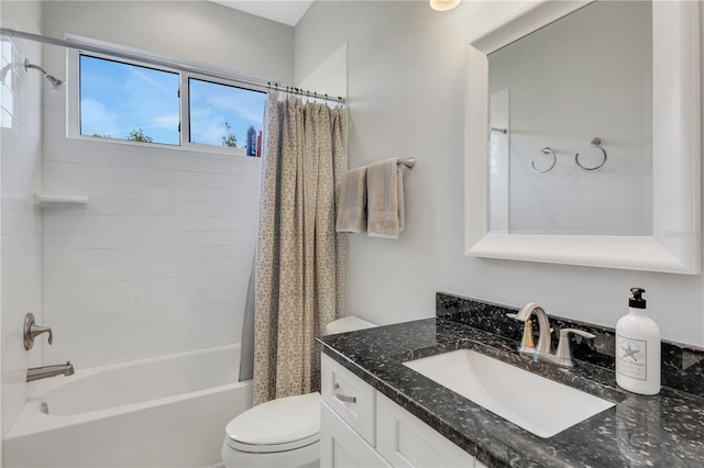 full bathroom featuring vanity, shower / bathtub combination with curtain, and toilet