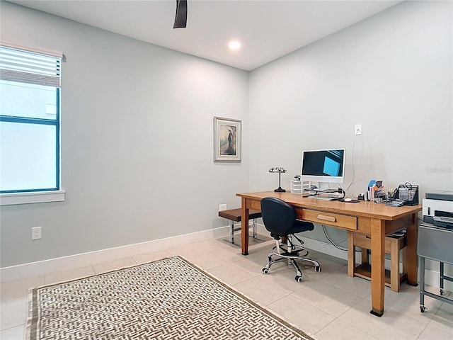 home office with light tile patterned floors