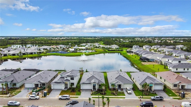 drone / aerial view with a water view