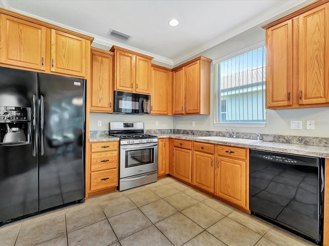 kitchen with crown molding, light tile patterned flooring, sink, and black appliances