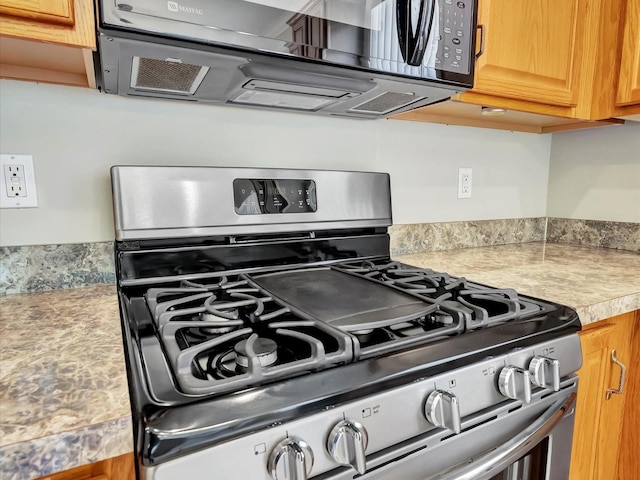 interior details featuring gas range