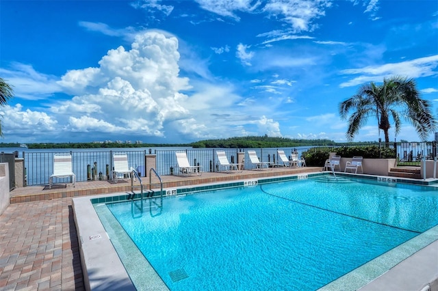 view of pool featuring a patio