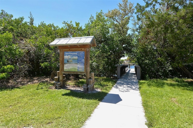 view of community featuring a yard