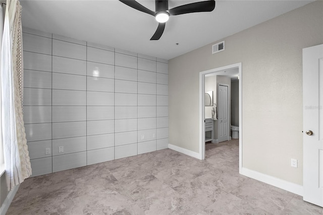 unfurnished bedroom featuring ceiling fan