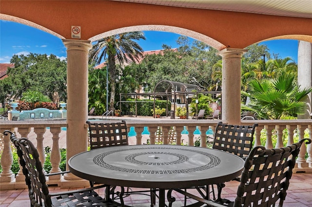 view of patio / terrace featuring a swimming pool