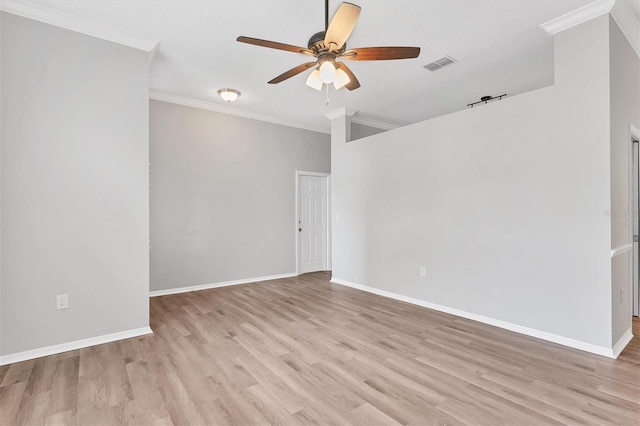 unfurnished room with ceiling fan, light hardwood / wood-style flooring, and ornamental molding