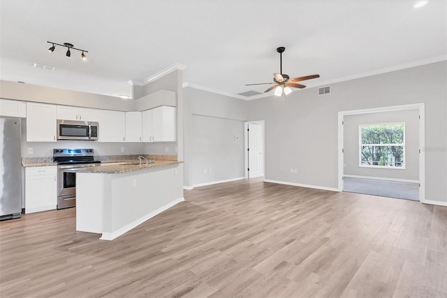 kitchen with white cabinetry, ceiling fan, kitchen peninsula, appliances with stainless steel finishes, and light wood-type flooring