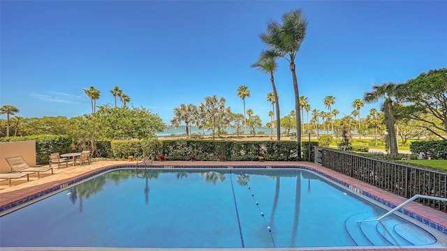 view of swimming pool featuring a patio