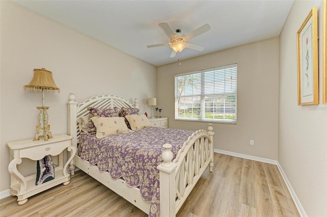 bedroom featuring ceiling fan and light wood-type flooring