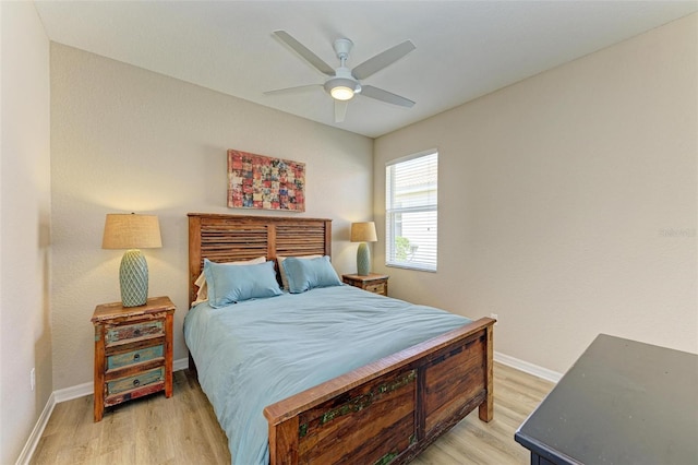 bedroom featuring ceiling fan and light hardwood / wood-style floors