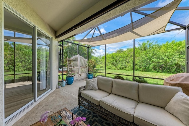 sunroom with lofted ceiling