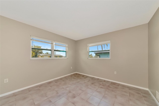 view of tiled spare room