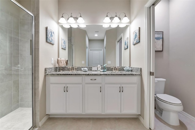 bathroom with walk in shower, tile patterned floors, vanity, and toilet