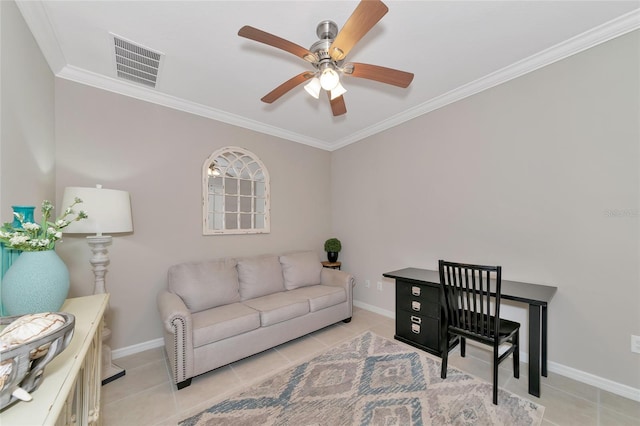 office featuring light tile patterned flooring, ceiling fan, and crown molding