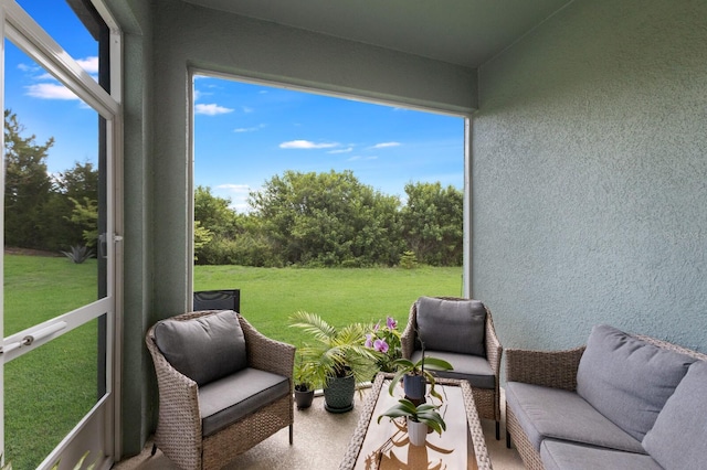 sunroom featuring a wealth of natural light