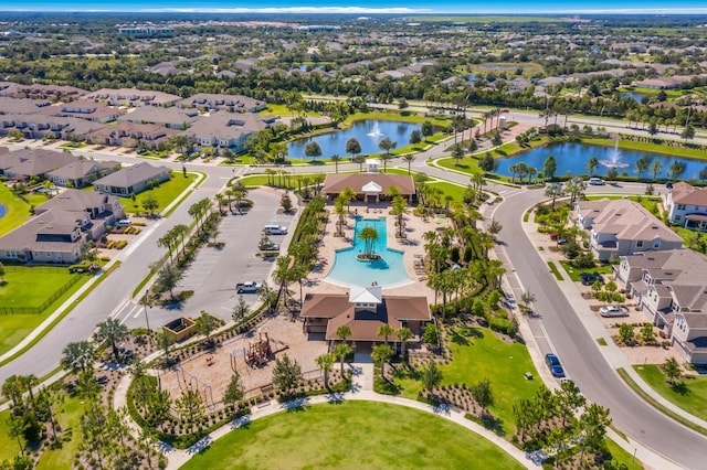 drone / aerial view with a water view